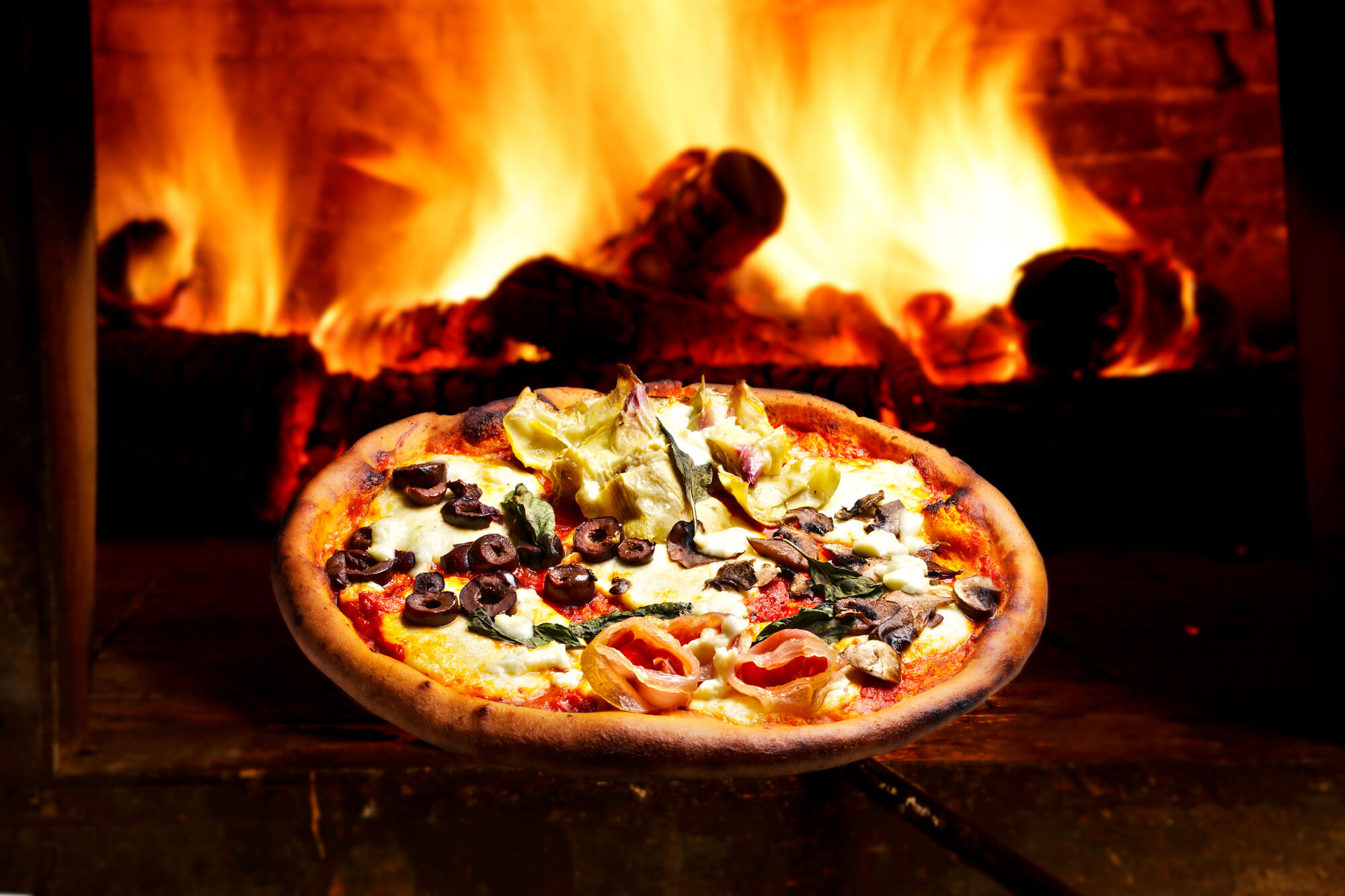 Promoção Pizzaria Real: Qualquer Pizza Grande no Forno à Lenha por R$ 22,99 (Ligue 3281-1317)