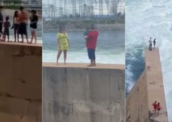 Visitantes com crianças se arriscam ao ultrapassar grade de proteção na barragem de Sobradinho (BA)